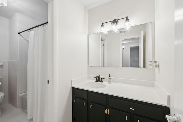 full bathroom with toilet, shower / tub combo, tile patterned floors, and vanity