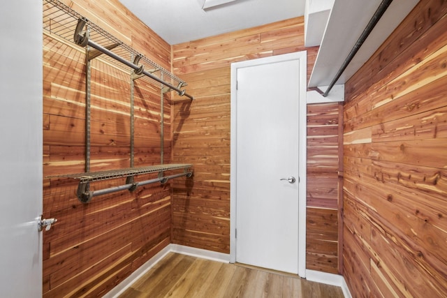 walk in closet featuring hardwood / wood-style floors