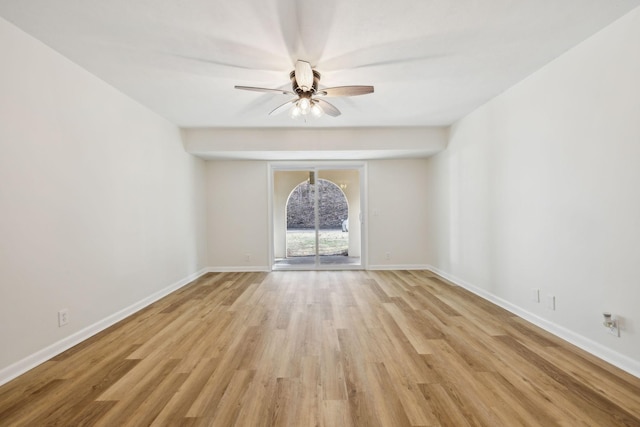 unfurnished room with light hardwood / wood-style flooring and ceiling fan