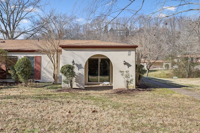 exterior space featuring a lawn