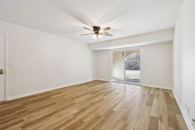 unfurnished room featuring ceiling fan and light hardwood / wood-style flooring