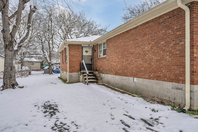 view of snow covered property