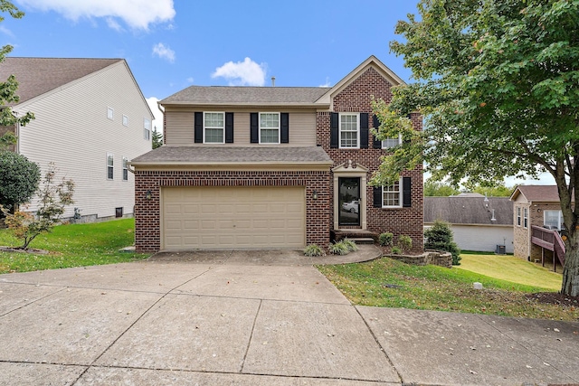 view of front facade with a front lawn and a garage