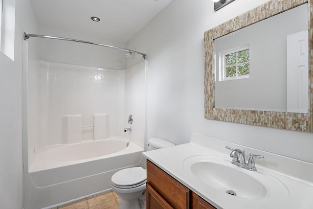 full bathroom with toilet, vanity, tile patterned floors, and washtub / shower combination