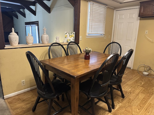 dining area with light wood-type flooring