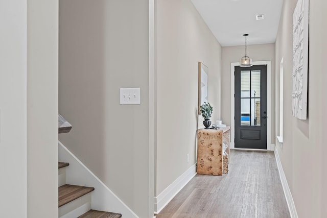 foyer entrance featuring light hardwood / wood-style flooring