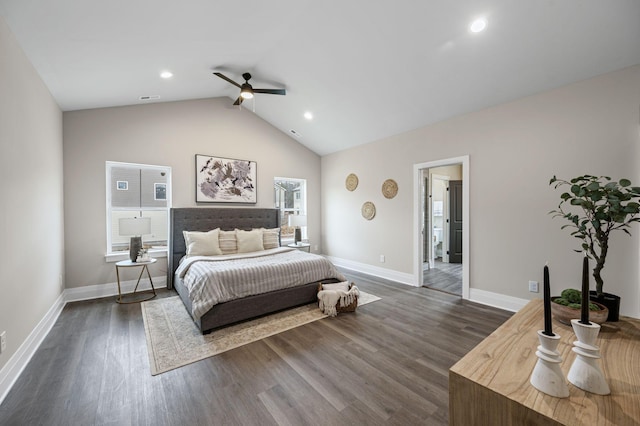 bedroom featuring dark wood-type flooring, ceiling fan, vaulted ceiling, and multiple windows