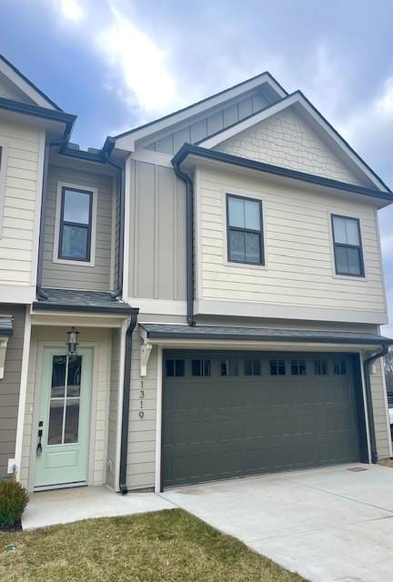 view of front of property with a garage