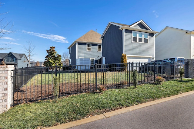 view of side of home featuring a yard and a garage