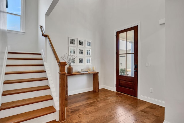 foyer entrance with hardwood / wood-style floors