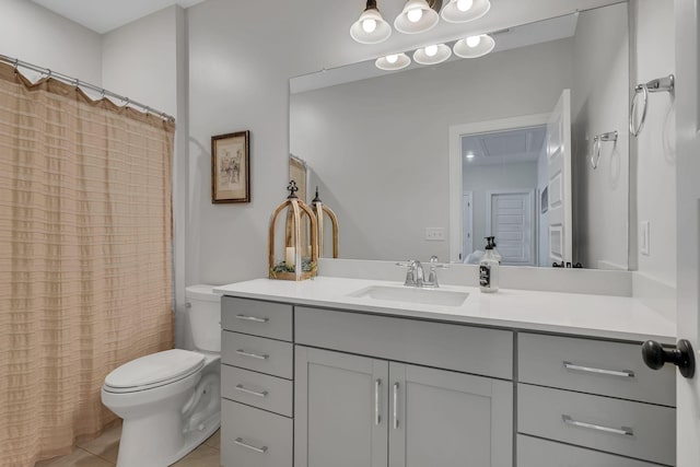 bathroom with tile patterned flooring, vanity, a shower with shower curtain, and toilet