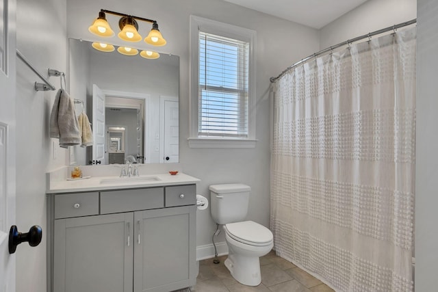 bathroom with tile patterned flooring, vanity, a shower with curtain, and toilet