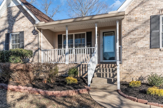 entrance to property with a porch