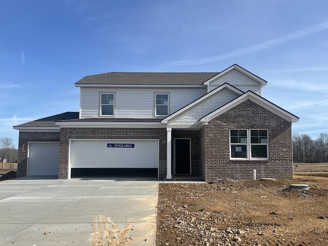 view of front of home with a garage