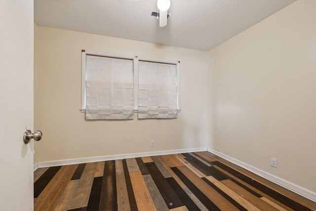 unfurnished room featuring hardwood / wood-style flooring and ceiling fan