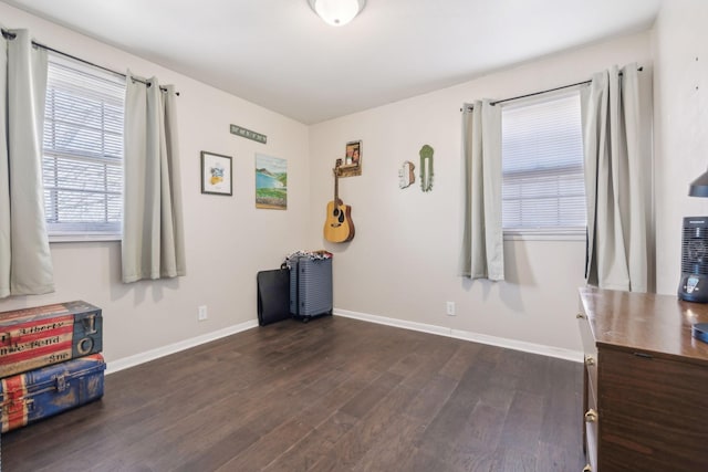 miscellaneous room featuring dark hardwood / wood-style floors