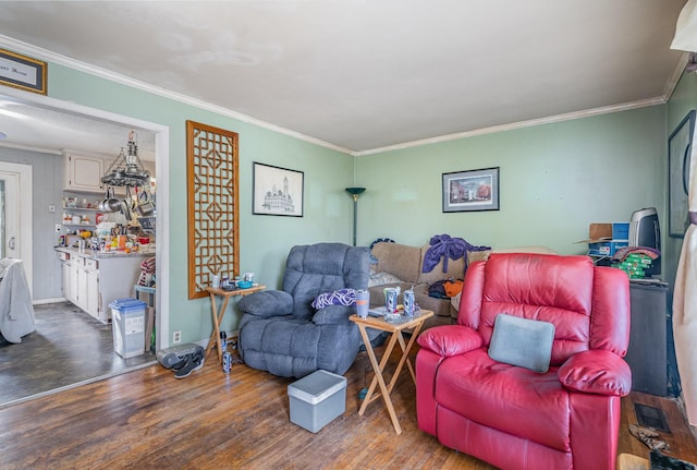 living room with crown molding and dark hardwood / wood-style floors