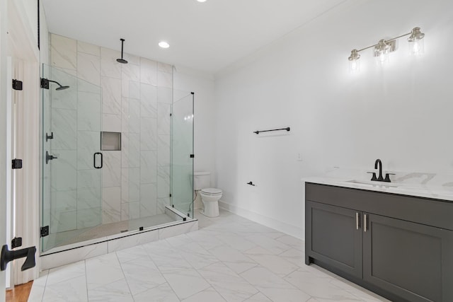 bathroom with toilet, an enclosed shower, and vanity