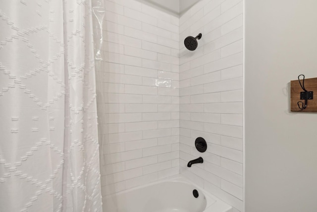 bathroom featuring shower / tub combo with curtain