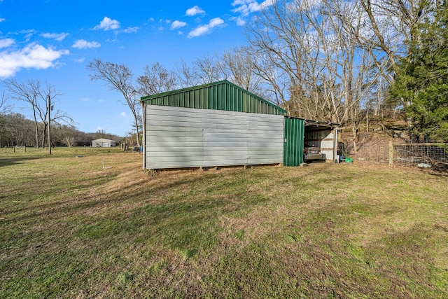 view of outdoor structure featuring a yard