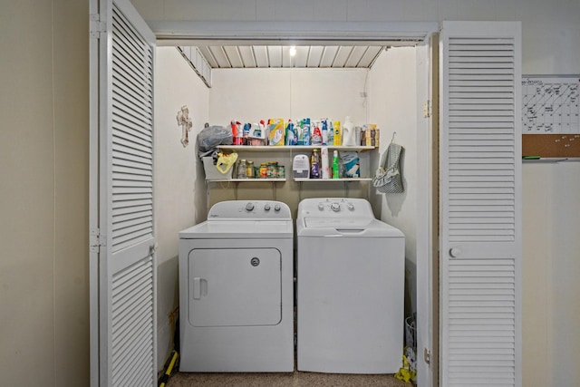 laundry room with washer and dryer