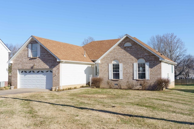 view of front facade with a front lawn, central AC, and a garage