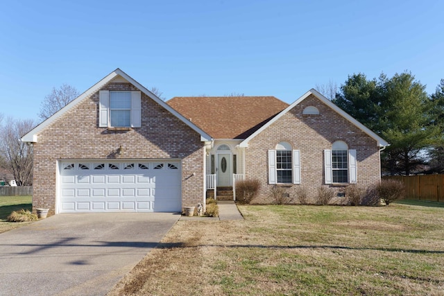 view of front facade featuring a front lawn and a garage