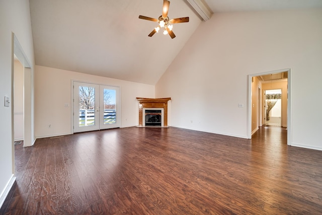 unfurnished living room featuring high vaulted ceiling, ceiling fan, beamed ceiling, and dark wood-type flooring