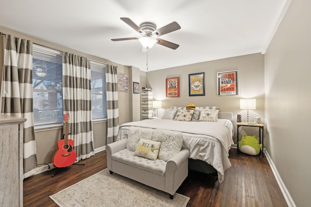 bedroom featuring ceiling fan and dark hardwood / wood-style flooring