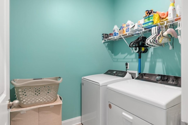 laundry area featuring washing machine and dryer