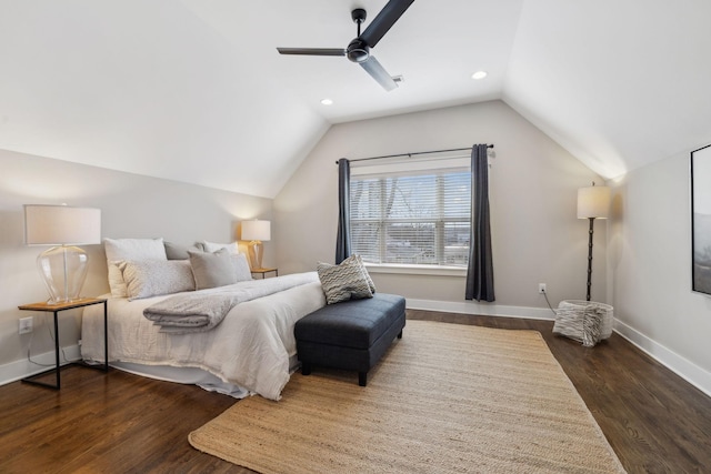 bedroom with lofted ceiling, dark hardwood / wood-style floors, and ceiling fan