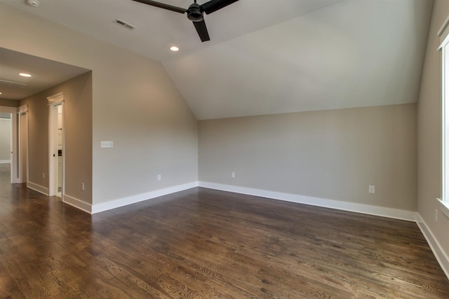 bonus room featuring vaulted ceiling, ceiling fan, and dark hardwood / wood-style flooring