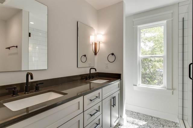 bathroom featuring vanity and tile patterned flooring