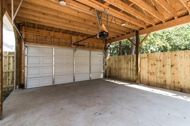 garage featuring a garage door opener