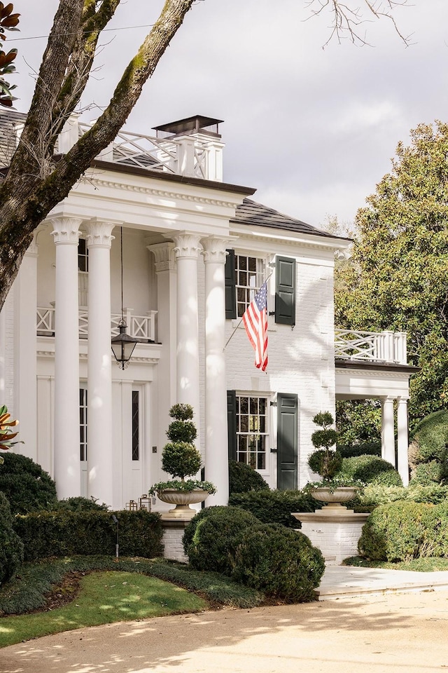 view of greek revival inspired property