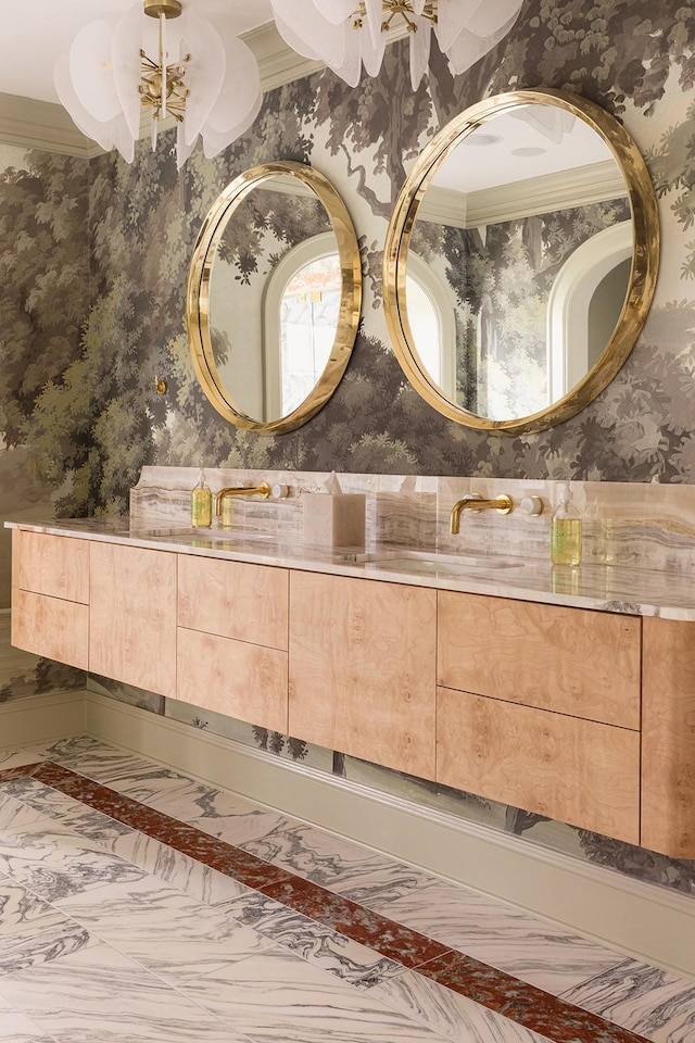 bathroom with vanity and crown molding