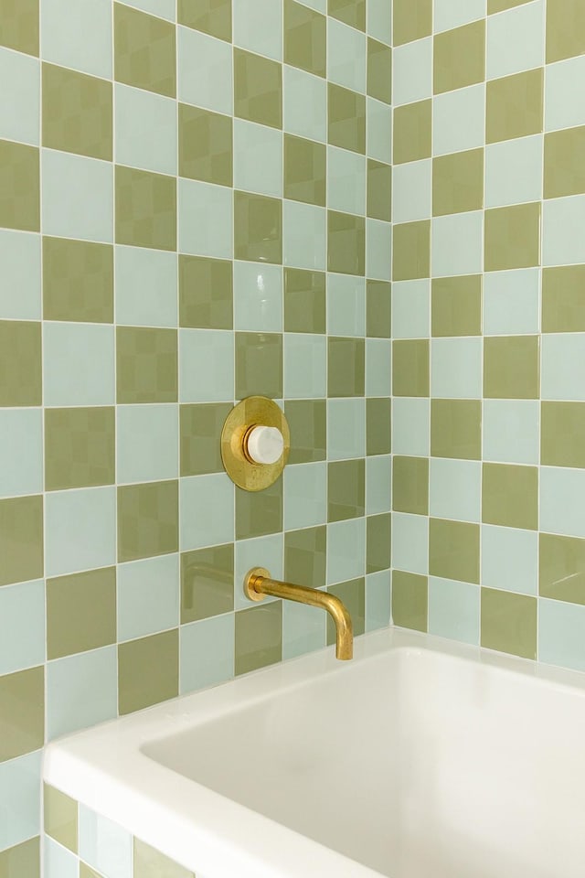 bathroom with a tub to relax in