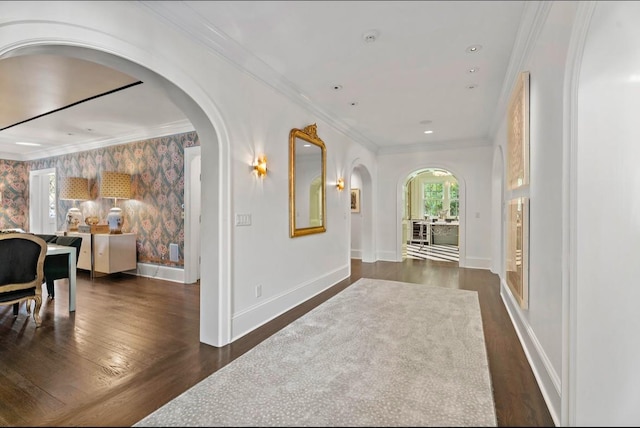 hall featuring dark hardwood / wood-style flooring and crown molding