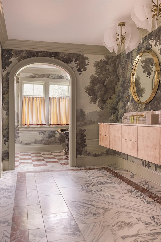 interior space with crown molding and vanity