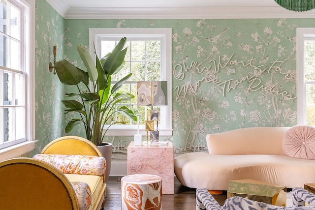 living area with dark wood-type flooring and crown molding