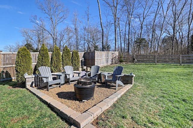 view of yard with an outdoor fire pit