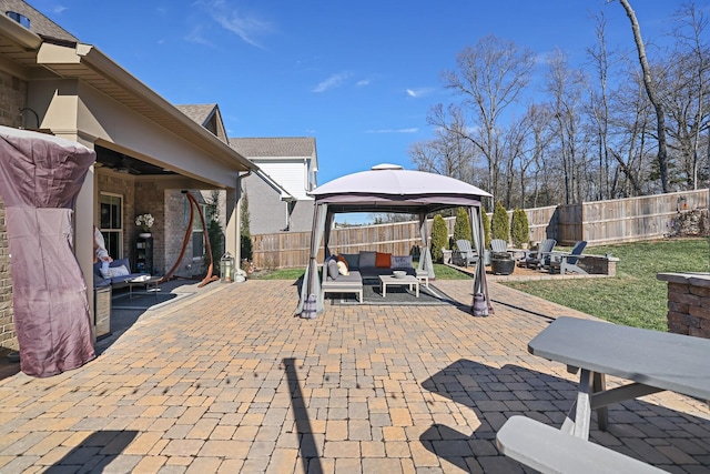 view of patio with a gazebo and outdoor lounge area