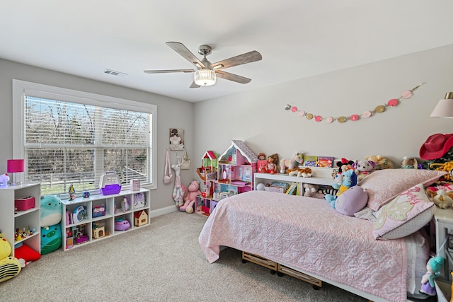 carpeted bedroom featuring ceiling fan