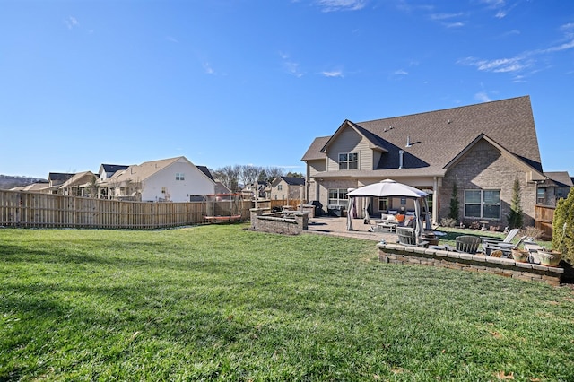 view of yard featuring a patio area and a gazebo