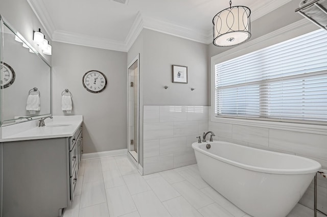 bathroom with tile walls, tile patterned floors, shower with separate bathtub, crown molding, and vanity