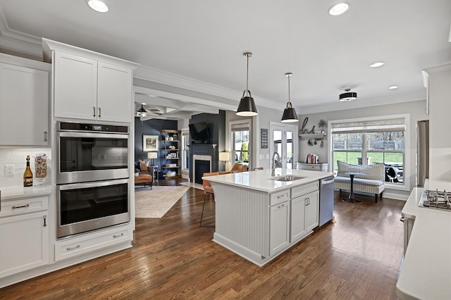 kitchen with white cabinets, sink, and stainless steel appliances