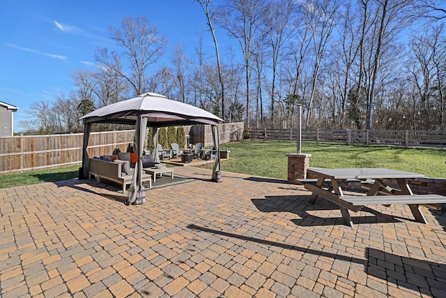 view of patio / terrace with an outdoor living space and a gazebo