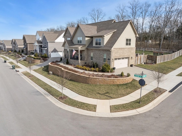 view of front facade with a front lawn and a garage