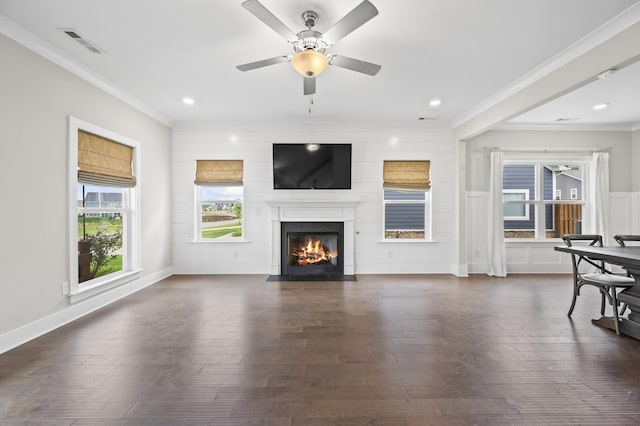 living room featuring dark hardwood / wood-style floors and crown molding