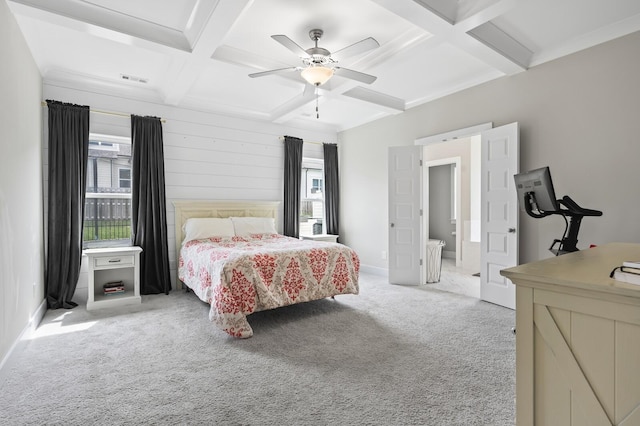 carpeted bedroom with ceiling fan, beam ceiling, and coffered ceiling